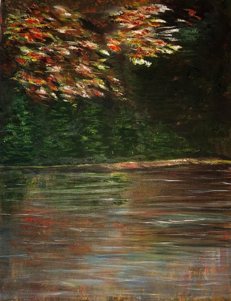 Reflection of leaves in the water