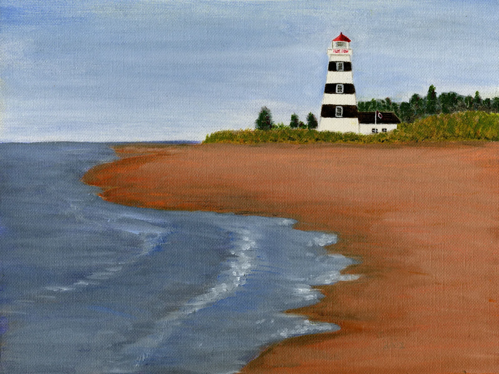 Sandy shore leading to West Point Lighthouse