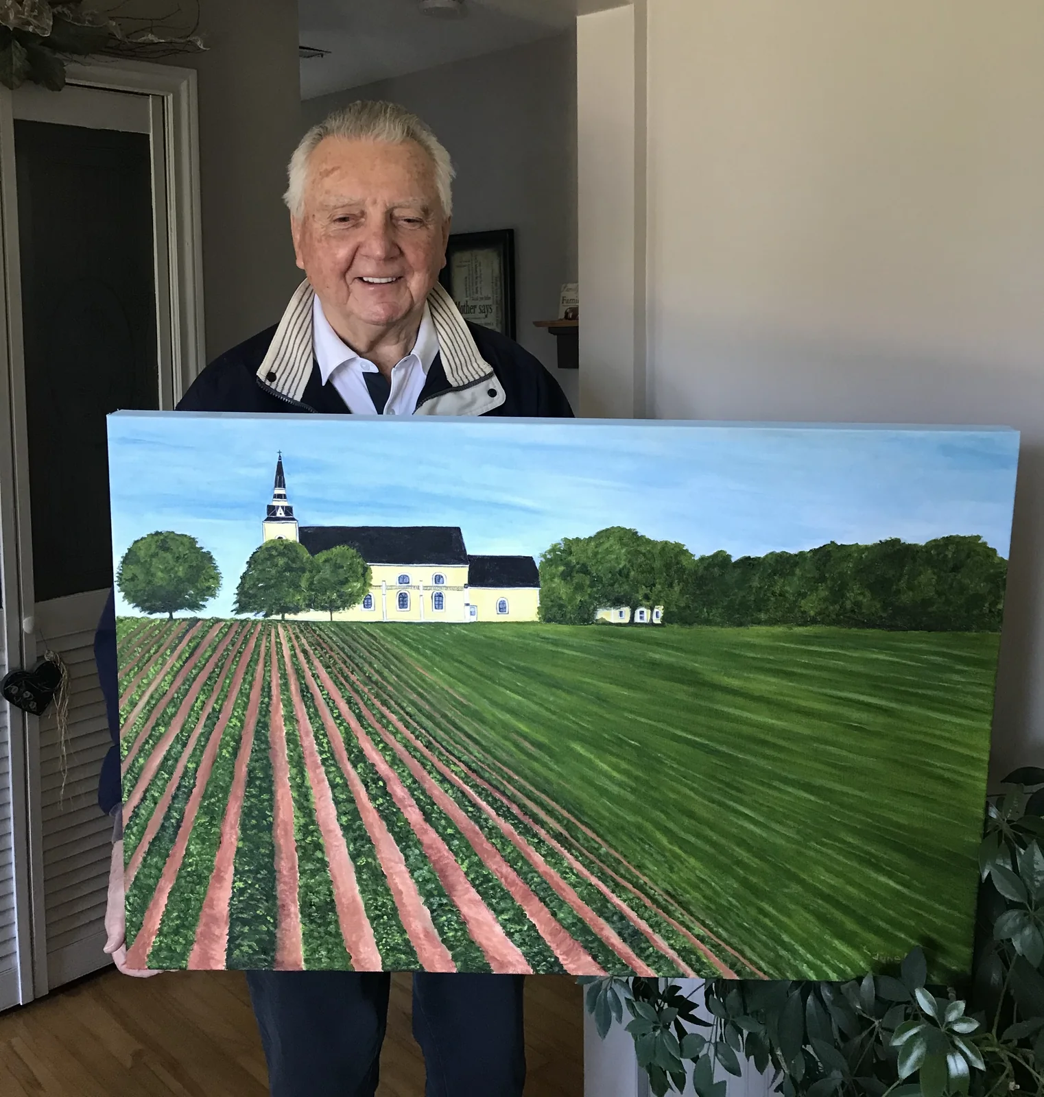 Don holding his finished church commission
